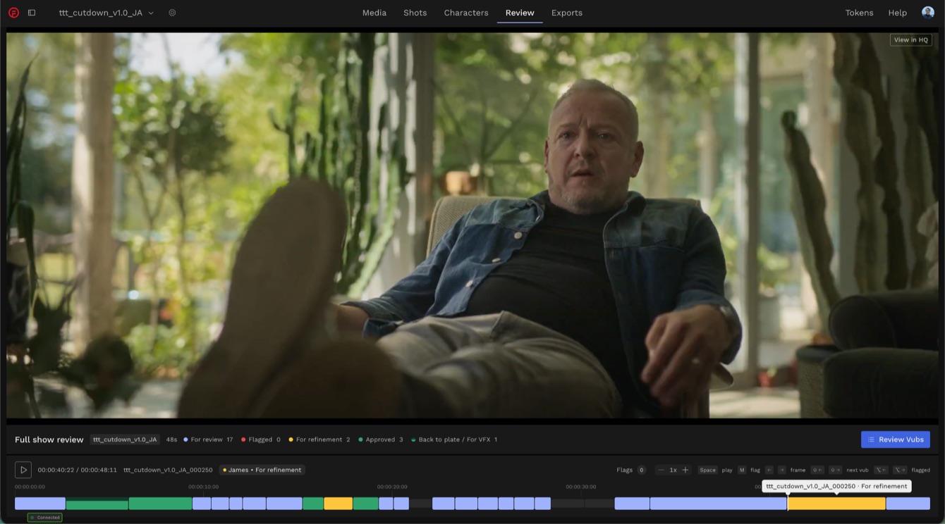 Review tab on the full show timeline, with shots color-coded by status under the player